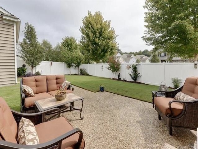 Represented home — landscaped backyard